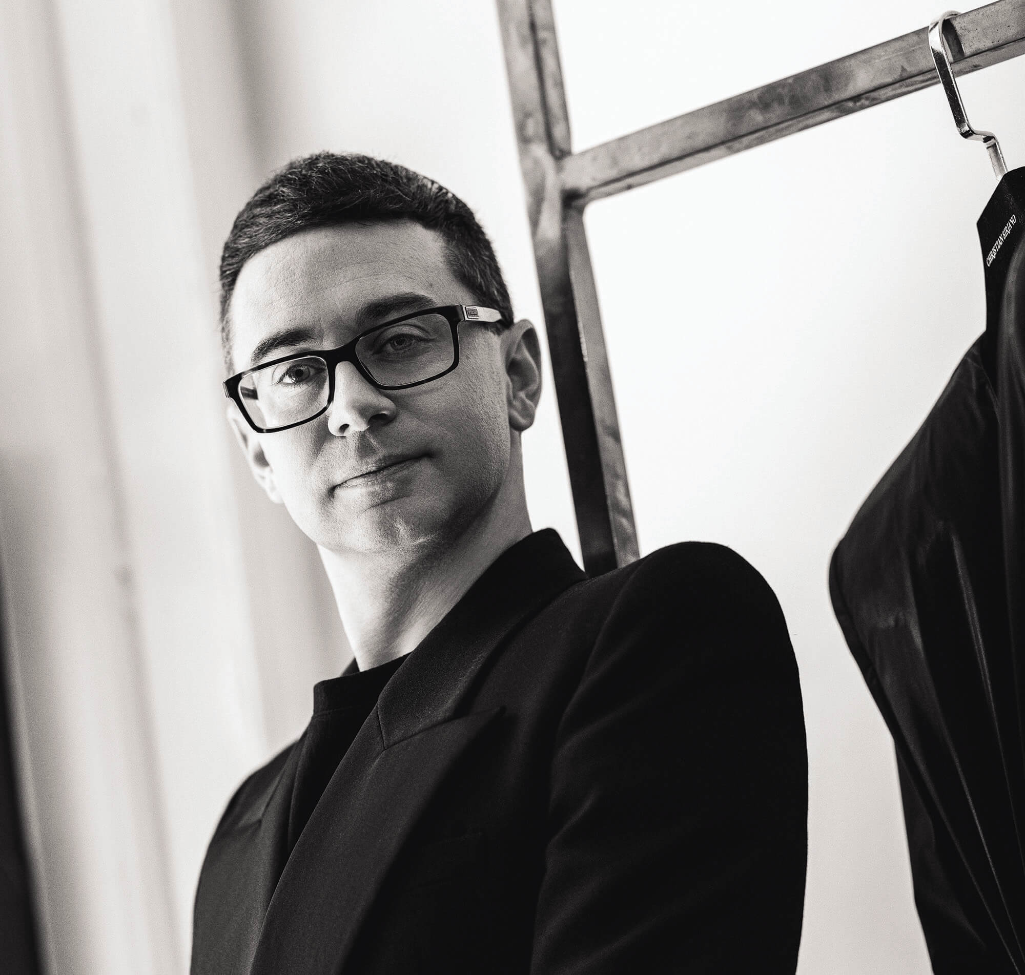 Christian Siriano Posing Indoors